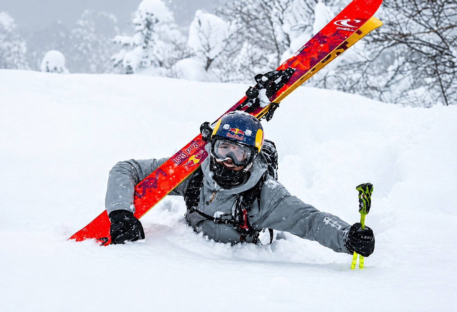 Skier resting in deep snow